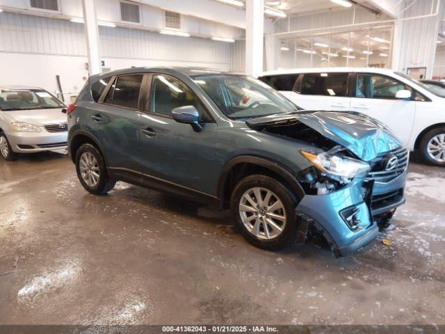  Salvage Mazda Cx